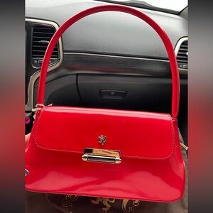 Pratesi Barchetta Italian Designer red bag, for more info inst: @mscurlywitch